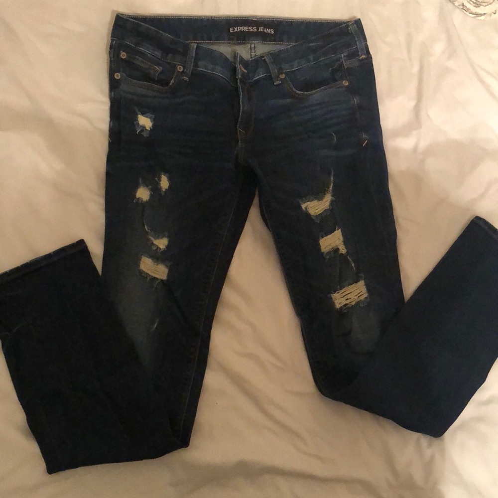 Express distressed low rise skinny jeans